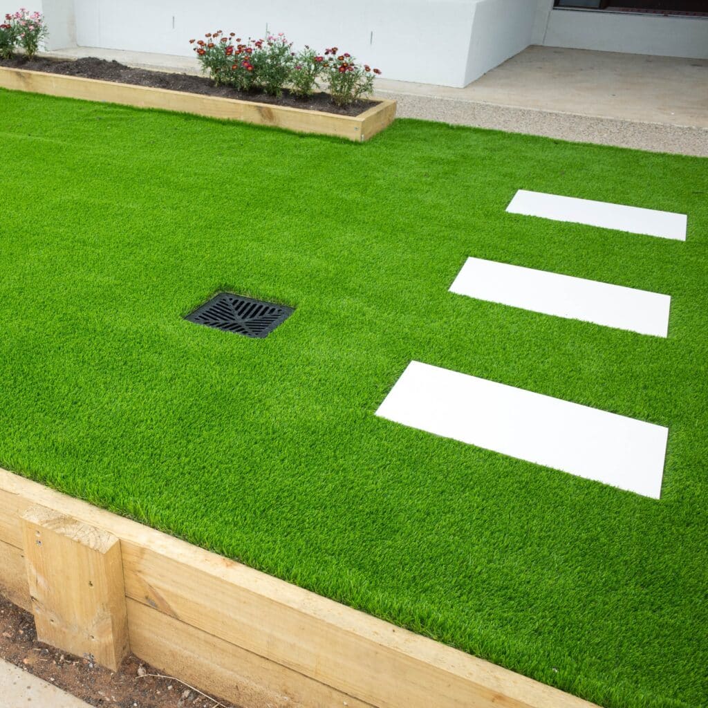 Artificial grass/lawn turf in the front yard of a modern home/residential house in Dorset